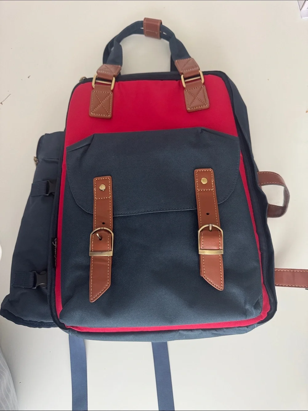 Navy and Red Canvas Backpack with Brown Trim